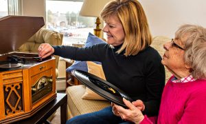 Resident and daughter playing records