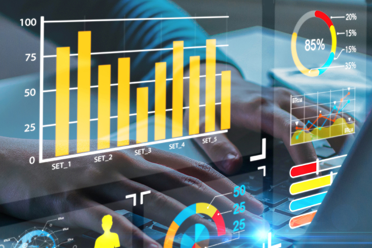 Graphic of bar charts in foreground and hands typing on keyboard in background