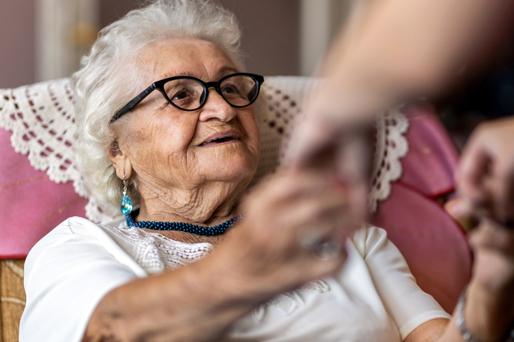 woman with dementia and caregiver