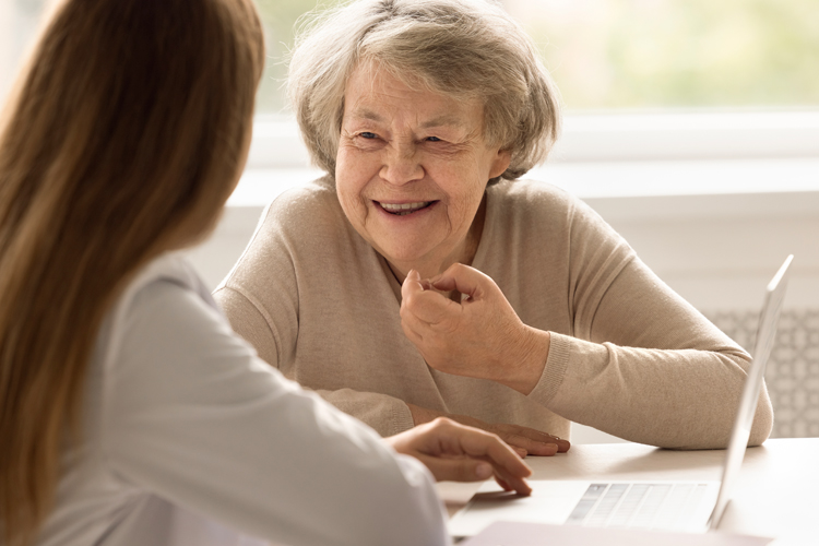 older woman talking to friend