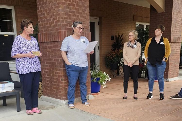 The suites at clermont park patio gathering