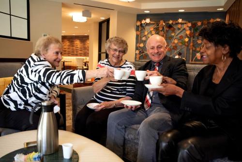 Clermont Park Residents and Executive Director Enjoying Coffe